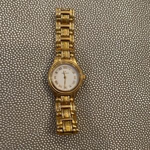 Movado gold tone watch